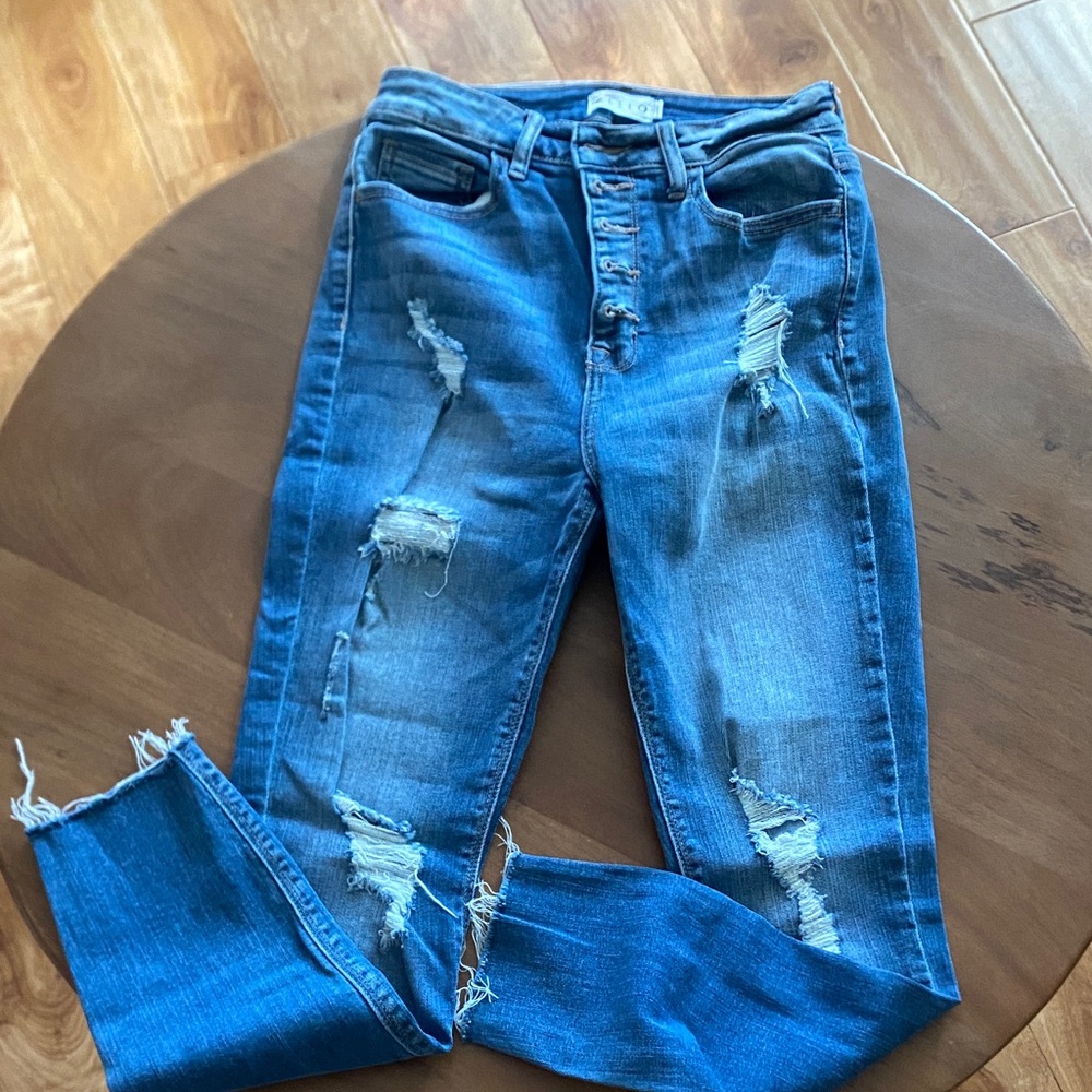 Distressed Blue jeans size 7